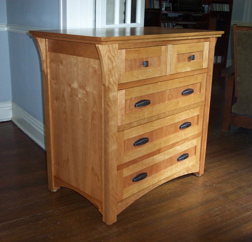 of furniture that included a matching Mission style dresser, armoire 